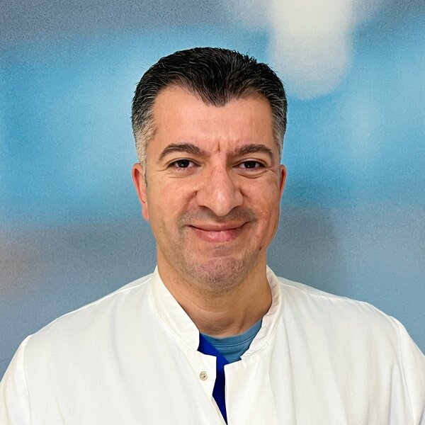 Dr. Eser Senesen