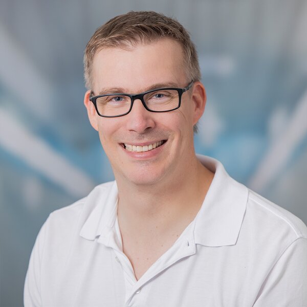 Dr. med. Tim Komm